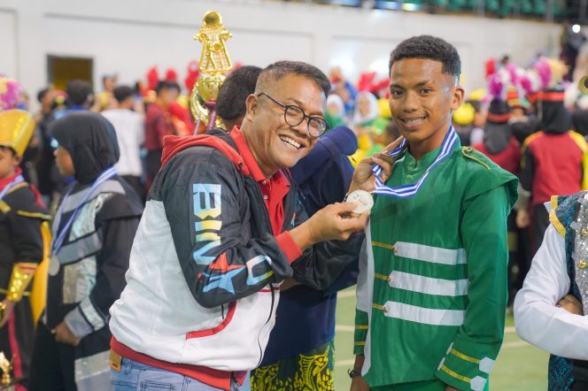 
					Ardi foto bersama peserta Marching Band dari Malaysia. Pada acara BIMAC2024