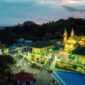 Komplek Balai Adat Pulau Penyengat di waktu malam dengan latar belakang Kota Tanjungpinang di waktu malam